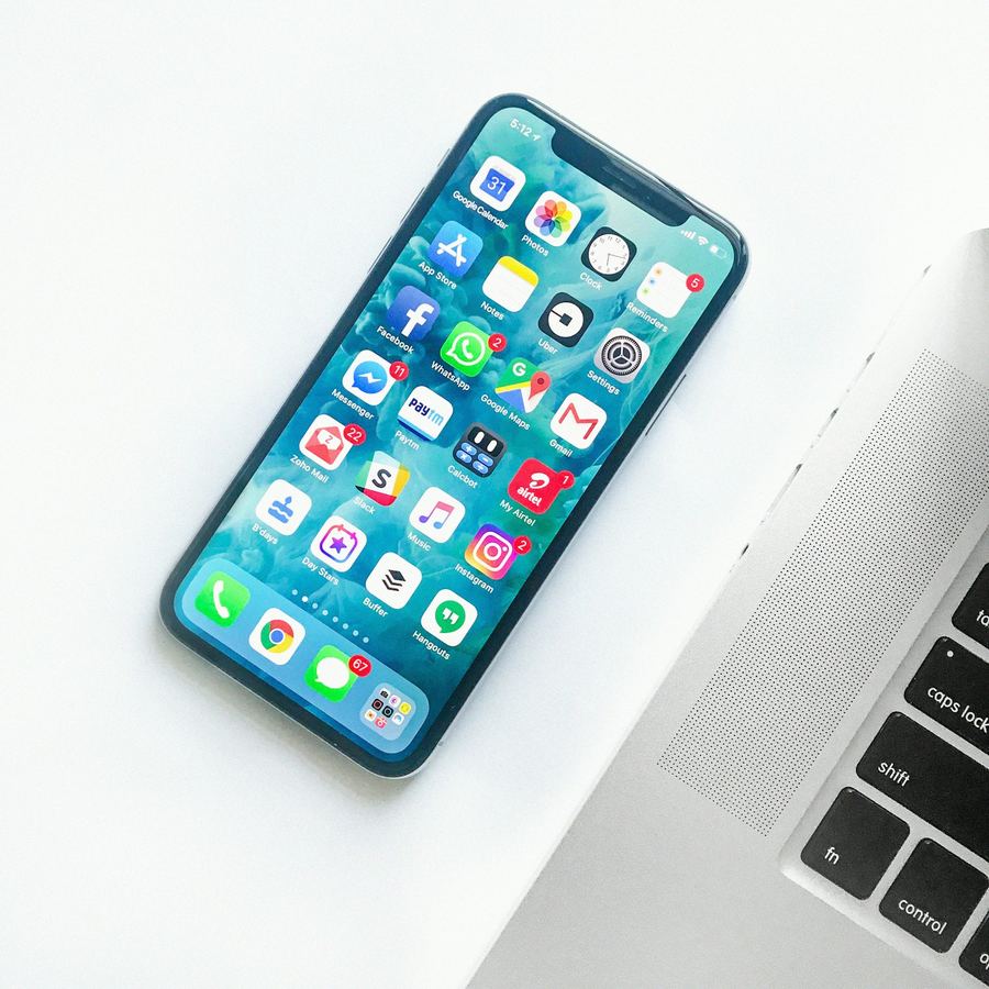 Modern iPhone on a desk for Apple phone repair in San Diego
